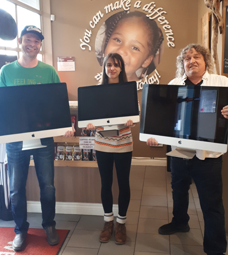 Don St Germain donating computers for children's birthday parties for families in need.